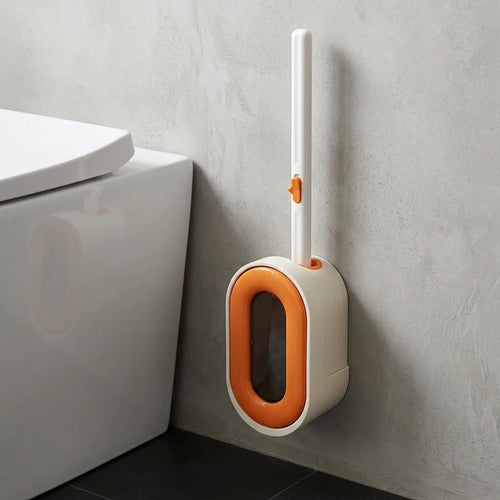 Brosse WC ÉCLA orange au mur